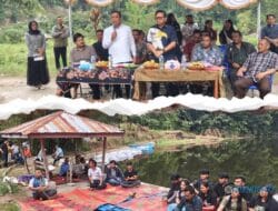 Restocking Benih Ikan Nila di Embung Desa Talimbaru, Upaya Pemkab Karo Lestarikan Ekosistem dan Tingkatkan Kesejahteraan Masyarakat