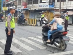 Polisi Hadir di Jalan Raya Sejak Pagi, Sat Lantas Polres Langkat Wujudkan Keamanan dan Kelancaran Aktivitas Masyarakat